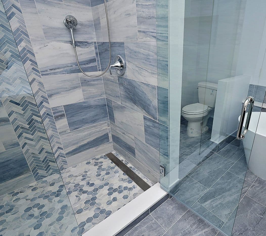 A newly-remodeled bathroom by EZPro Kitchen & Baths.